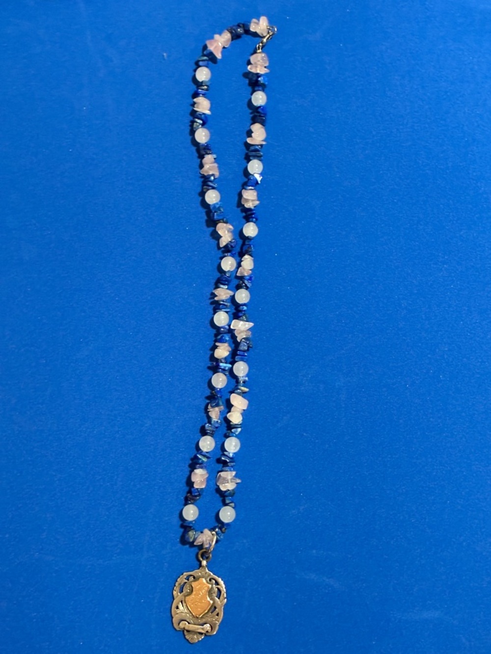 24" necklace made of Raw opals & Raw lapis w/ Stir Silver & rose gold pendant.